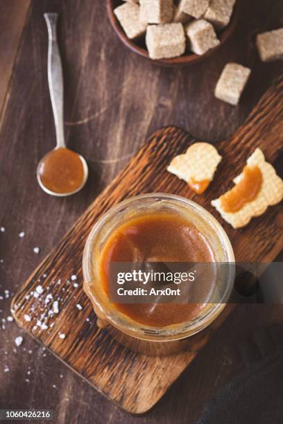 homemade salted caramel sauce - toffee stock pictures, royalty-free photos & images