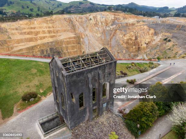 aerial view over the cornish pumphouse mine in waihi, new zealand - martha mine stock pictures, royalty-free photos & images