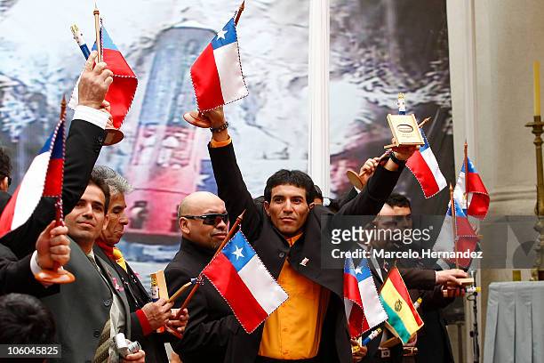 Chilean miners during a ceremony with President Sebastian Pineda in honor to the 33 miners previously trapped at San Jose mine at La Moneda...