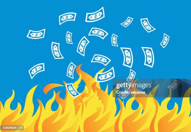 geld schwammen ins meer des feuers - geld verheizen stock-grafiken, -clipart, -cartoons und -symbole
