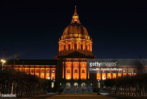 San Francisco city hall is seen illuminated with orange lights in honor of the San Francisco Giants winning the Major League Baseball National League...