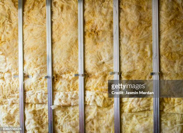 rock wool of an home wall - insulator stock pictures, royalty-free photos & images