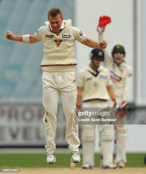 Xavier Doherty of the Tigers celebrates after appealing successfully to dismiss Matthew Wade of the Bushrangers during the Sheffield Shield match...