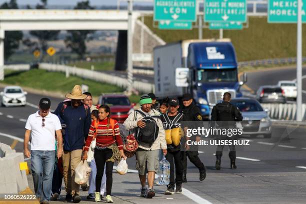 Central American migrants moving in a caravan towards the United States, head to a shelter, in the outskirts of Zapotlanejo, Jalisco state, Mexico on...