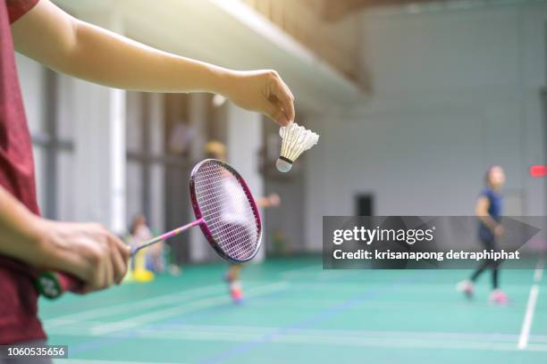 men playing badminton,exercise,badminton - badminton stock-fotos und bilder