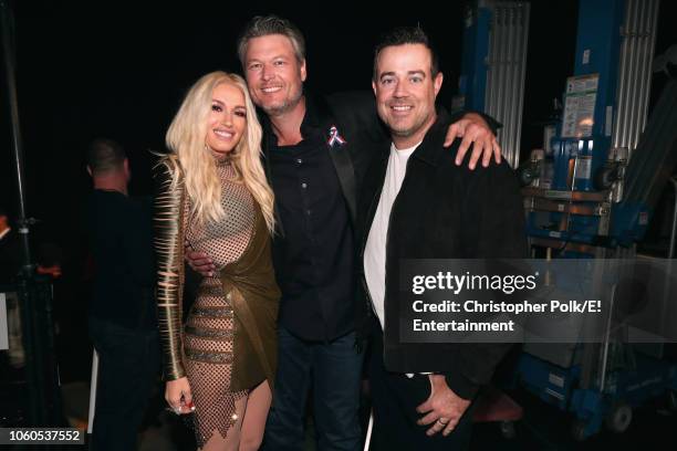 Pictured: Recording artists-TV personalities Gwen Stefani and Blake Shelton and TV personality Carson Daly pose during the 2018 E! People's Choice...