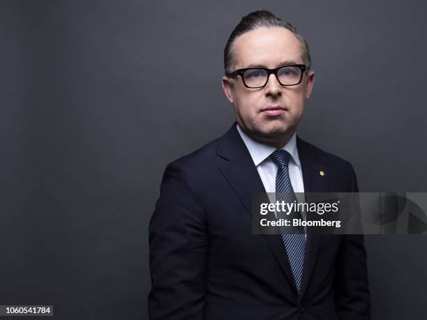 Alan Joyce, chief executive officer of Qantas Airways Ltd., poses for a photograph ahead of a Bloomberg Television interview in Hong Kong, China, on...