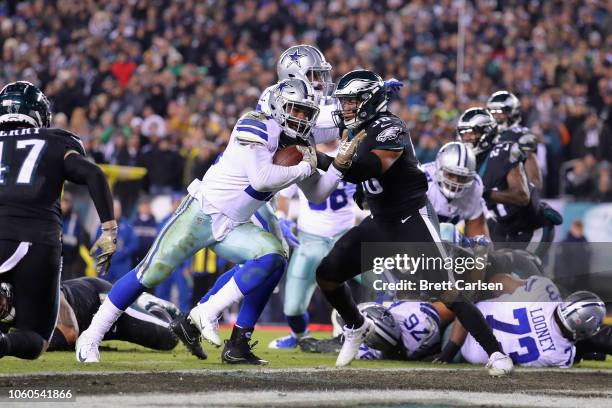 Running back Ezekiel Elliott of the Dallas Cowboys makes a touchdown run to lead 26-20 against the Philadelphia Eagles during the fourth quarter at...