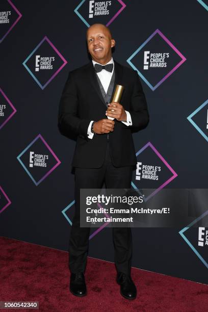 Pictured: Honoree Bryan Stevenson, recipient of the People's Champion award, poses in the press room during the 2018 E! People's Choice Awards held...