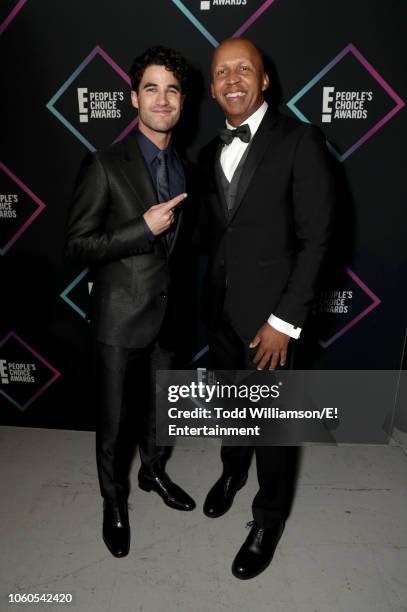 Pictured: Darren Criss and Honoree Bryan Stevenson backstage during the 2018 E! People's Choice Awards held at the Barker Hangar on November 11, 2018...