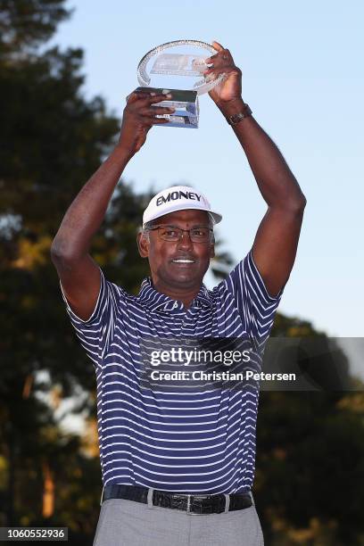 Vijay Singh of Fiji Islands celebrates with the trophy after winning the Charles Schwab Cup Championship at Phoenix Country Club on November 11, 2018...