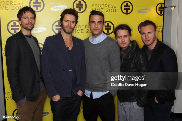 Jason Orange, Howard Donald, Robbie Williams, Mark Owen and Gary Barlow of Take That attend a press conference to announce their new stadium tour...