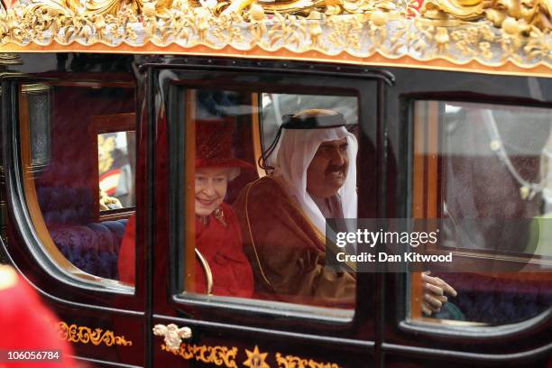 The Emir of Qatar, Sheikh Hamad bin Khalifa al Thani and Queen Elizabeth II make their way to Windsor Castle, on October 26, 2010 in Windsor,...