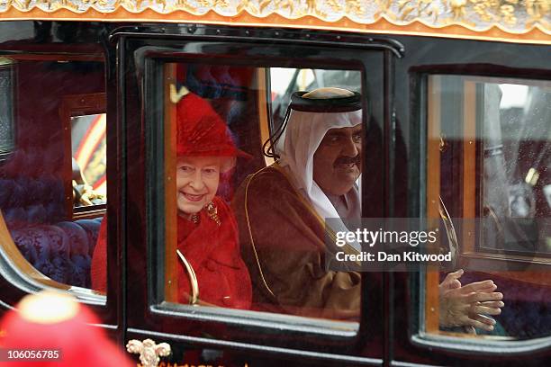 The Emir of Qatar, Sheikh Hamad bin Khalifa al Thani and Queen Elizabeth II make their way to Windsor Castle, on October 26, 2010 in Windsor,...