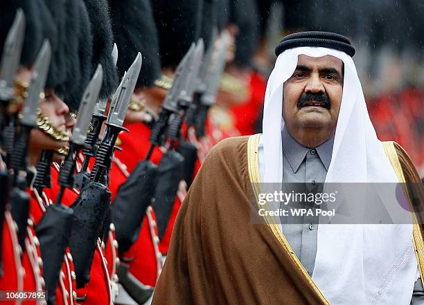 The Emir of Qatar, Sheikh Hamad bin Khalifa al Thani is greeted on October 26, 2010 in Windsor, England. The Sheikh is on a two day State visit to...