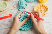 woman hands knitting crochet. hobby crafts things. Top view. Horizontal composition