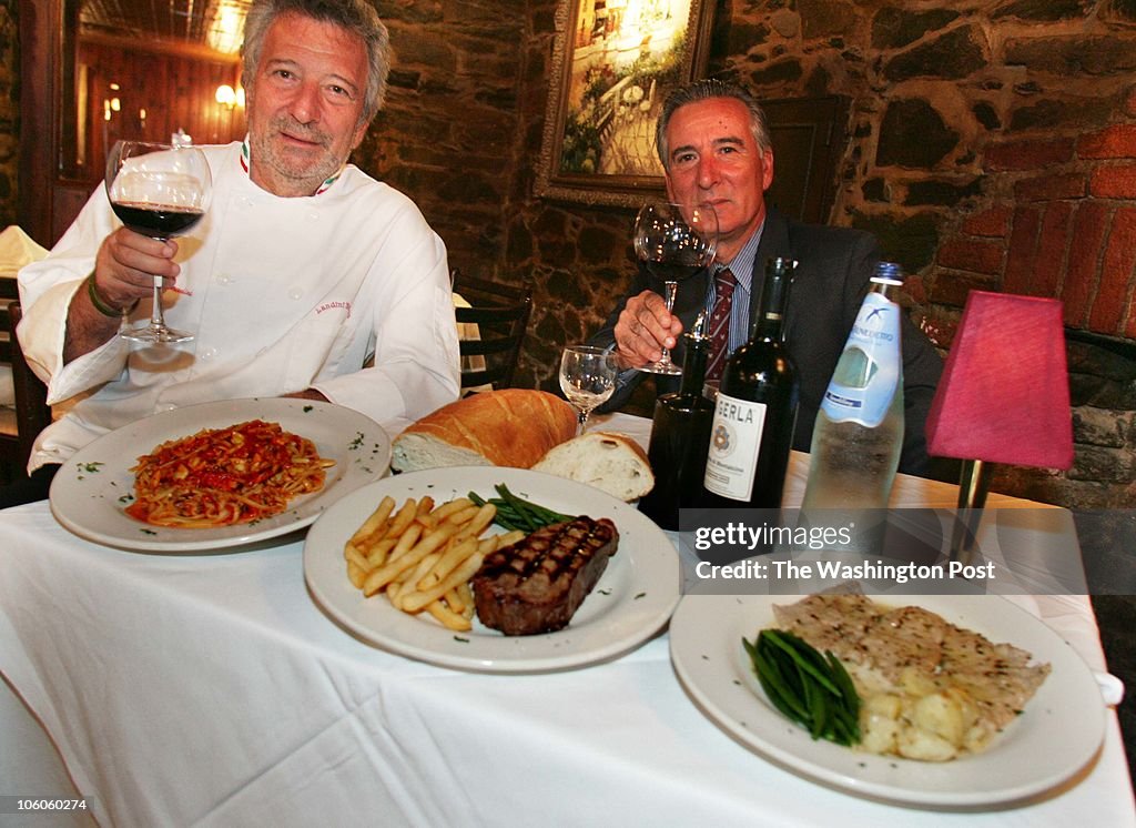Ax-flavor28 09-01-2006 #183457 Mark Gail_TWP from the left-Franco and Piero Landini sit at a table w