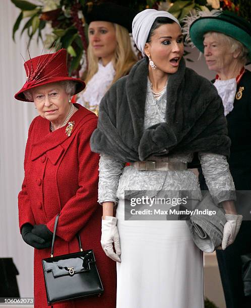 Queen Elizabeth II and Sheikha Mozah bint Nasser Al-Missned attend the ceremonial welcome for The Emir of the State of Qatar, Sheikh Hamad bin...