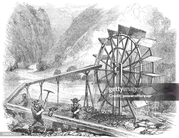 panning for gold using a flutter-wheel at the tuolumne river in california, usa (19th century) - water wheel stock illustrations