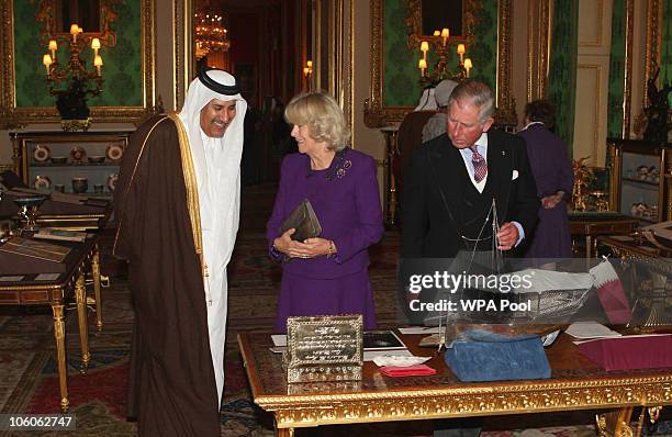 Prince Charles, Prince of Wales and Camilla, Duchess of Cornwall show Prime Minister and Foreign Minister of Qatar His Excellency Sheikh Hamad bin...