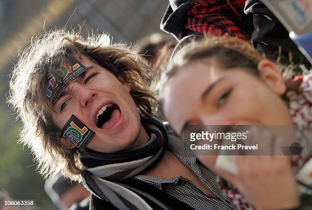 French university students and striking workers attend a demonstration over pension reforms near the French Senate October 26, 2010 in Paris, France....