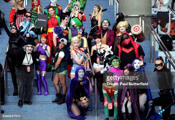 Cosplayers dressed as DC Comics characters pose for a photo during Los Angeles Comic Con at Los Angeles Convention Center on October 27, 2018 in Los...