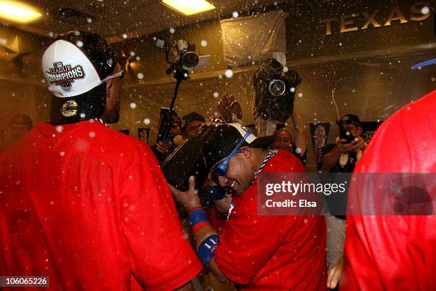 Bengie Molina of the Texas Rangers celebrates in the locker room after the Rangers won 6-1 against the New York Yankees in Game Six of the ALCS...