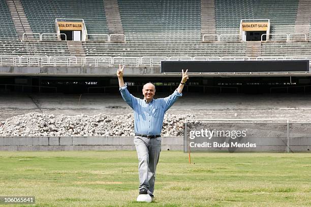 Presidential candidate of Brazil Jose Serra poses for photos during a visit to the renovation works of Maracana Stadium as part of his campaign on...