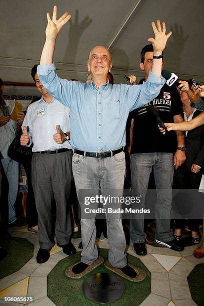 Presidential candidate of Brazil Jose Serra poses for photos during a visit to the renovation works of Maracana Stadium as part of his campaign on...