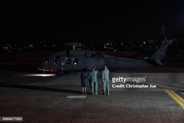 Vice President Mike Pence and his wife Karen Pence are transported in a Black Hawk helicopter after arriving at Yokota Air Base on November 13, 2018...