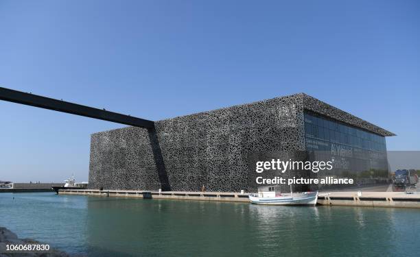 September 2018, France , Marseille: Visitors cross a bridge to reach "MuCEM", the museum of European and Mediterranean civilizations. It was opened...