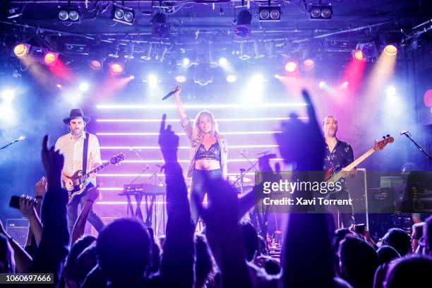 James Shaw, Emily Haines and Joshua Winstead of Metric perform in concert at sala Bikini on November 11, 2018 in Barcelona, Spain.