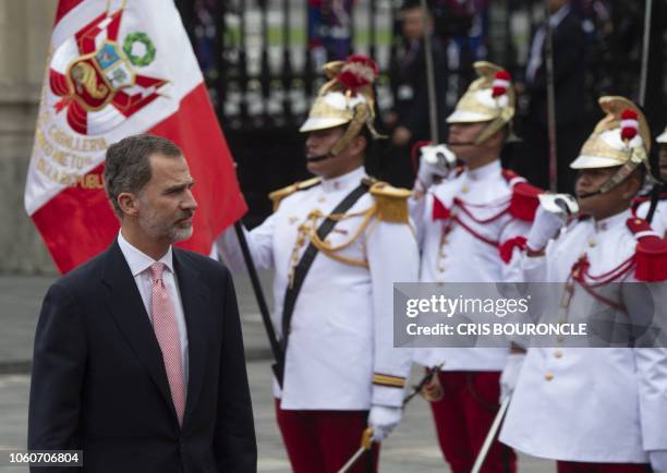 King Felipe VI of Spain arrives with Queen Letizia at the Government Palace in Lima on November 12, 2018 for a meeting with Peru's President Martin...