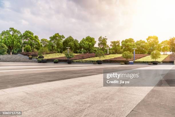 urban square with garden against sky - pavement background stock pictures, royalty-free photos & images