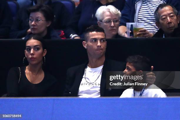 Cristiano Ronaldo, his girlfriend Georgina Rodríguez and son Cristiano Ronaldo Jr. Watch on during the singles round robin match between Novak...