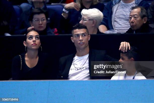 Cristiano Ronaldo, his girlfriend Georgina Rodríguez and son Cristiano Ronaldo Jr. Watch on during the singles round robin match between Novak...