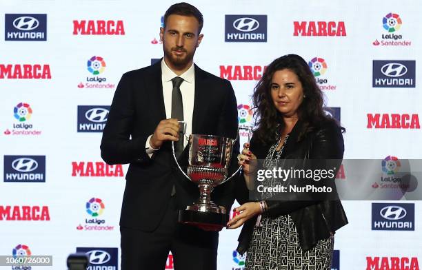 Atletico Madrid's Slovenian goalkeeper Jan Oblak poses after receiving the Zamora trophy for the 2017-18 goalkeeper who conceded least goals of the...