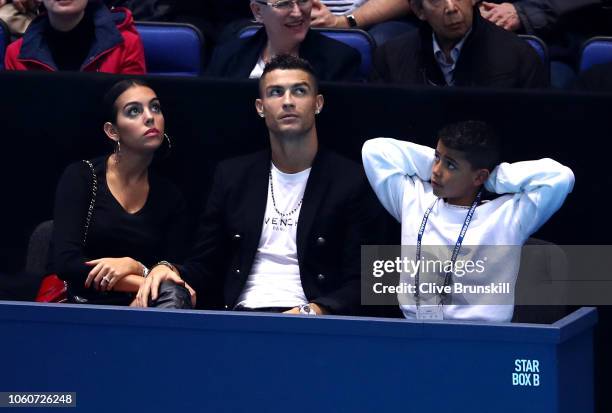 Cristiano Ronaldo, his girlfriend Georgina Rodríguez and son Cristiano Ronaldo Jr. Watch on during the singles round robin match between Novak...