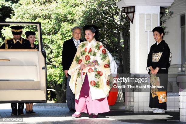 Princess Ayako of Takamado leaves her residence while her mother Princess Hisako of Takamado looks on prior to her wedding with Kei Moriya at the...