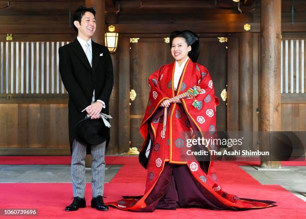 Princess Ayako of Takamado and Kei Moriya speak to media reporters after their wedding at Meiji Jingu Shrine on October 29, 2018 in Tokyo, Japan.