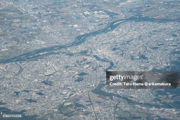 okazaki city in aichi prefecture in japan daytime aerial view from airplane - okazaki stock pictures, royalty-free photos & images