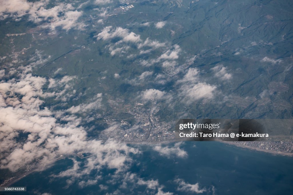 Suruga Bay and Shizuoka city (Yui and Kanbara area) in Shizuoka prefecture in Japan daytime aerial view from airplane