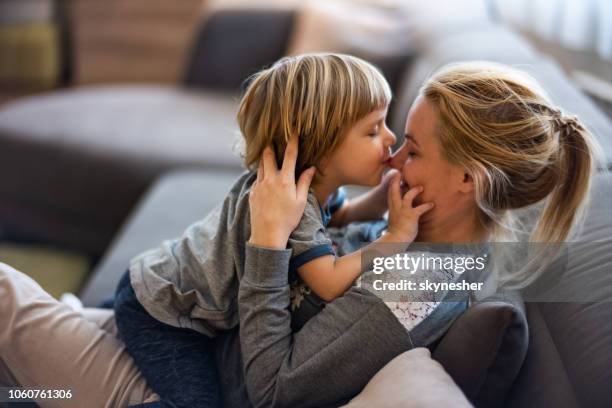 the bond that lasts for a lifetime! - nose kisses stock pictures, royalty-free photos & images