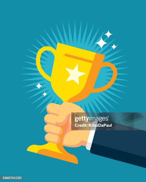 hand holding trophy - hand holding trophy stock illustrations
