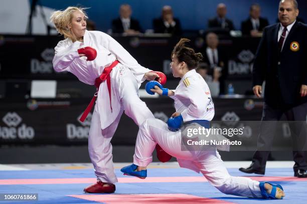 Greek karateka Eleni Chatziliadou and Japanese karateka Ayumi Uekusa are seen in action as they competes for the Kumite female +68kg final...