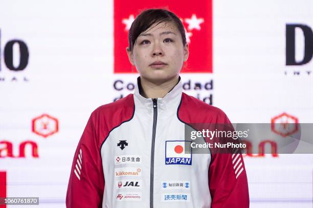 Medalist of the Kumite female +68kg competition silver Japanese Ayumi Uekusa pose on the podium of the 24th Karate World Championships at Wizink...