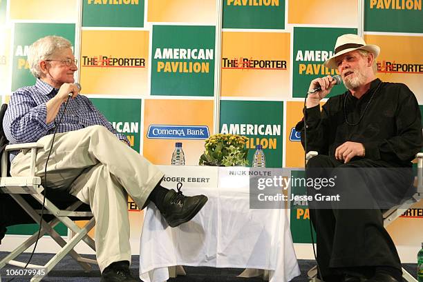 Roger Ebert and Nick Nolte during 2006 Cannes Film Festival - American Pavillion - Day 5 at American Pavillion in Cannes, France.
