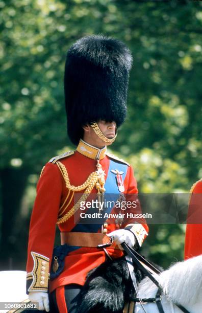 Prince Charles, Prince of Wales, wearing a huge busby, takes part in Trooping the Colour on June 01, 1976 in London, England.