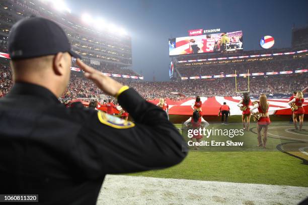 San Francisco 49ers Gold Rush cheerleader kneels during the national anthem prior to the NFL game between the San Francisco 49ers and the New York...