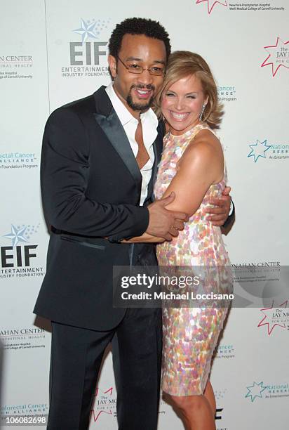 John Legend and Katie Couric during Katie Couric, EIF and NCCRA Present "Hollywood Meets Motown" Benefit - Arrivals at The Waldorf Astoria Hotel in...